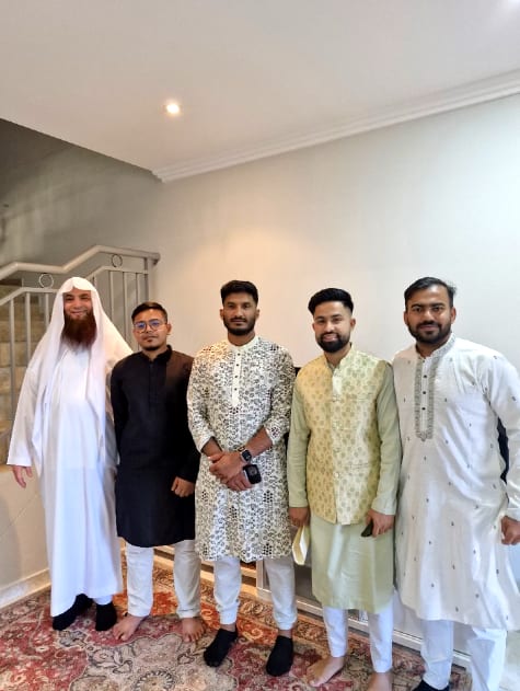 The celebrant with the groom and his family after the Nikah