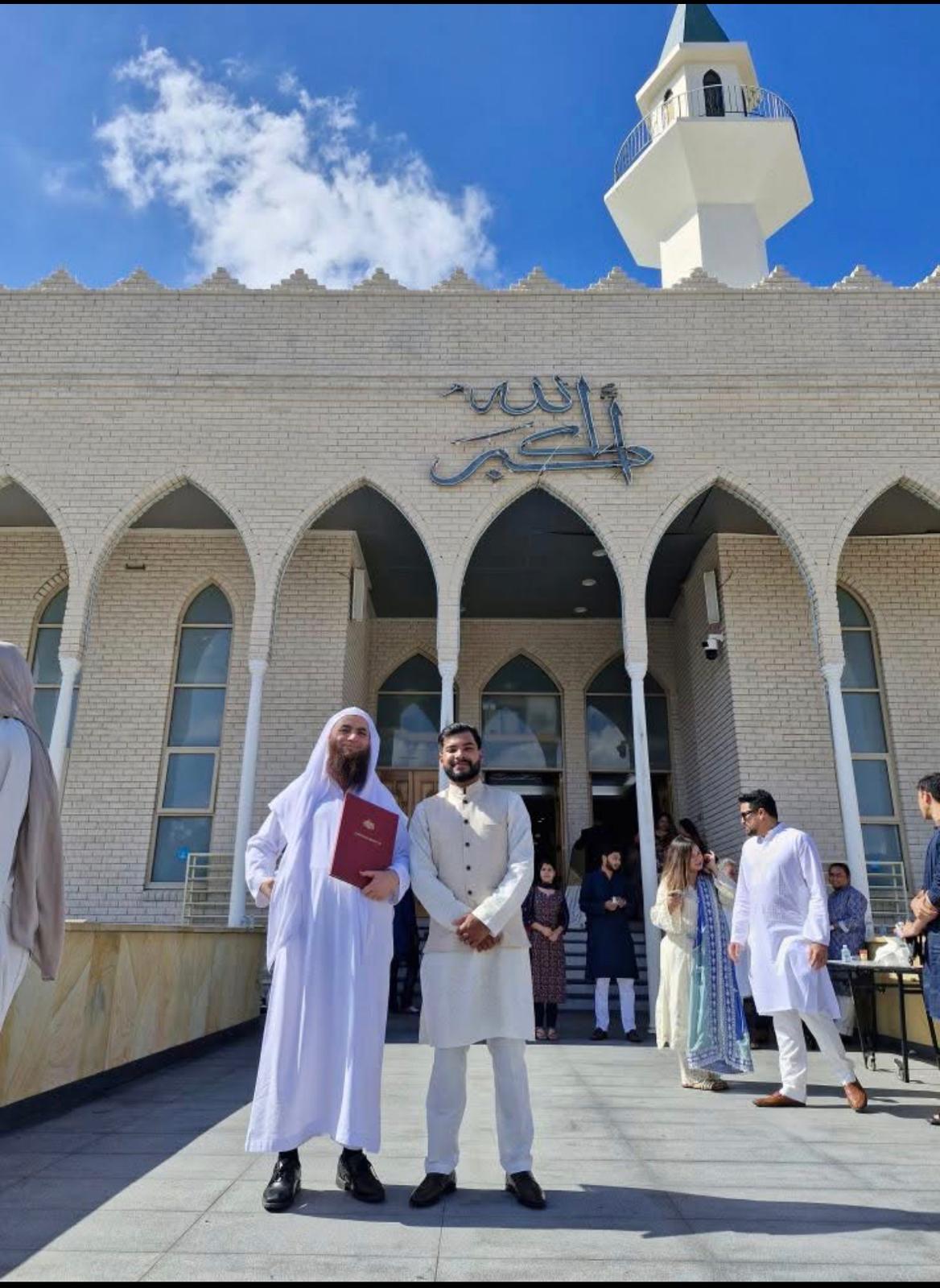 Outside the mosque with the marriage certificate